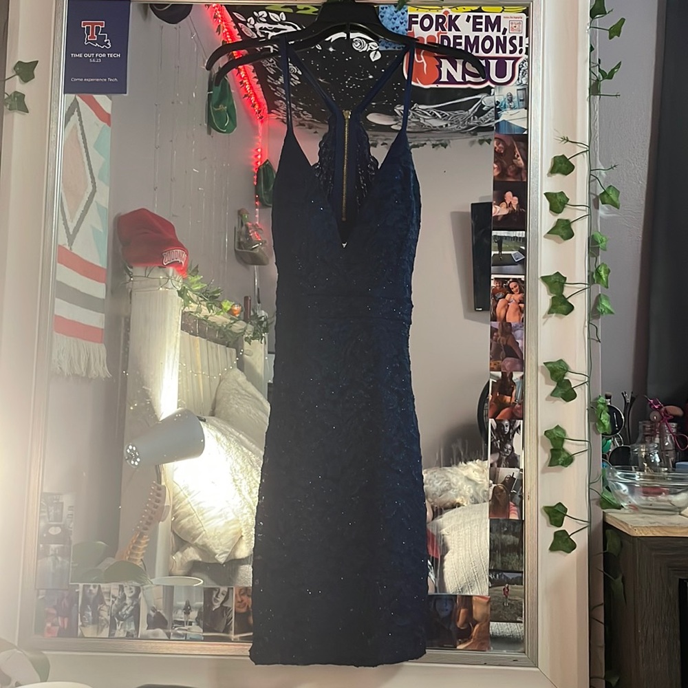 has been worn once or twice. in good condition; the color is beautiful